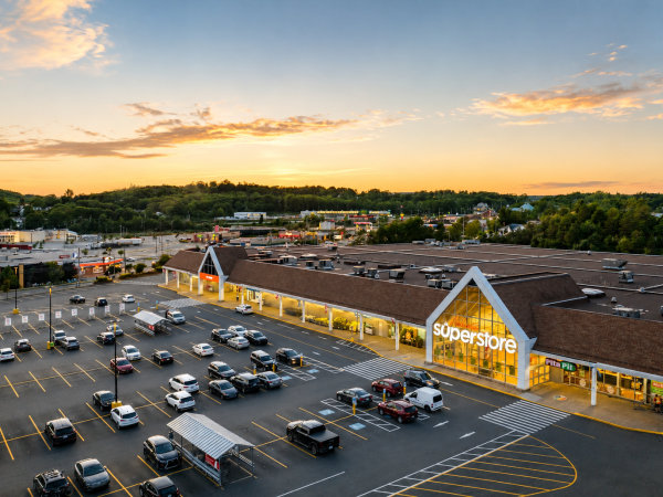 Sunset over suburban shopping plaza