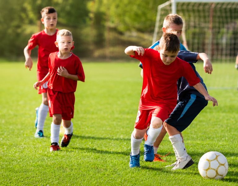 Children playing soccer